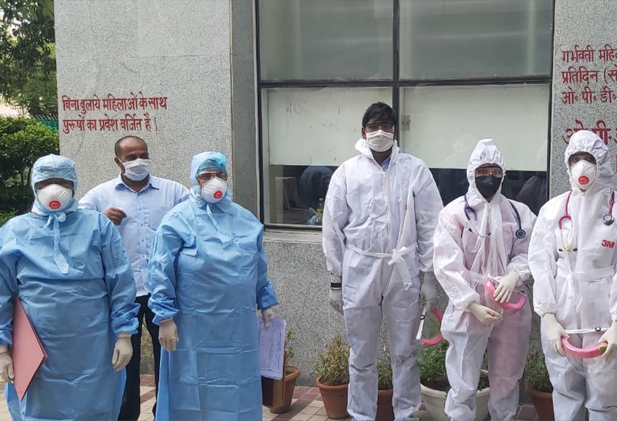 Doctors using protective equipment provided by EIM