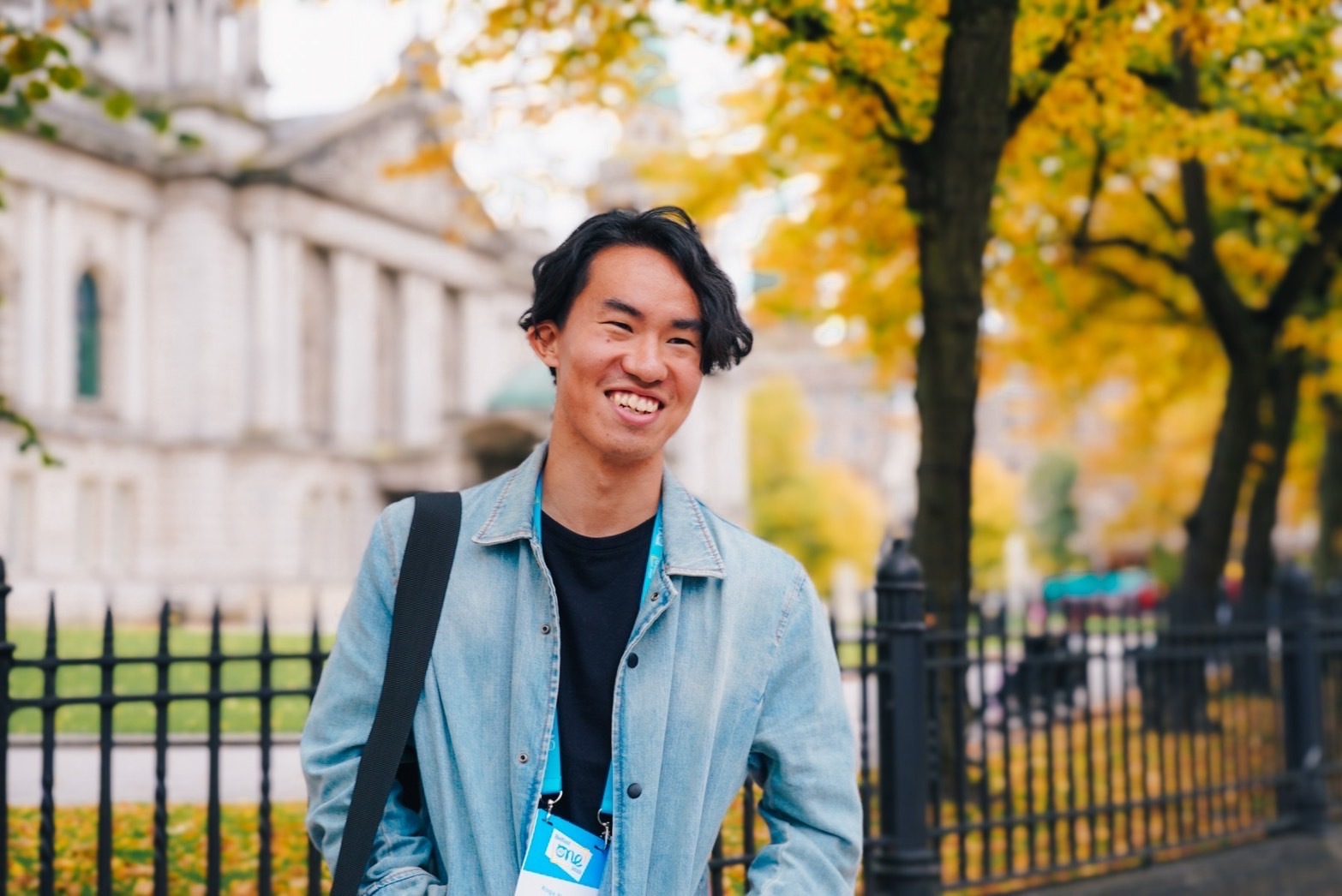 Koga smiling at the One Young World Summit Belfast, 2023